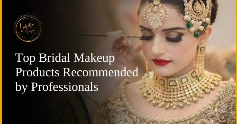 A South Asian bride adorned in gold jewelry and bridal makeup, highlighting her flawless complexion and dramatic eyes.